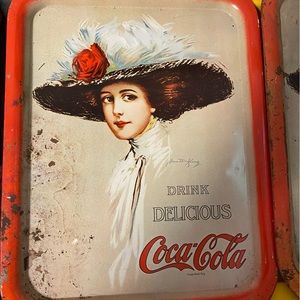 2 Coca Cola trays.